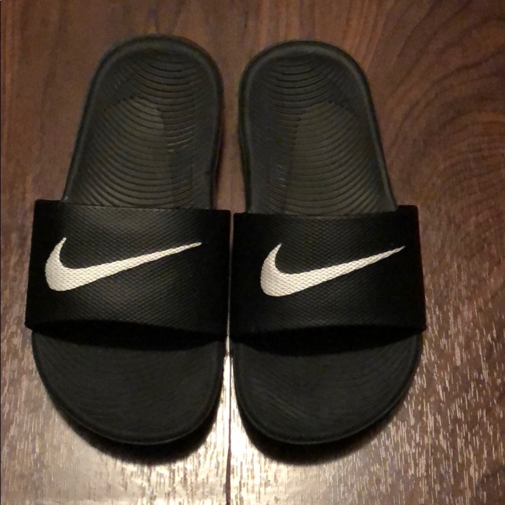 Boys Nike slip on sandals